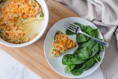 plate with whole quiche and plate with quiche slice with min leaves