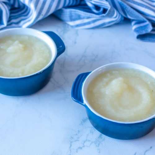 Pear sauce inside two blue bowls