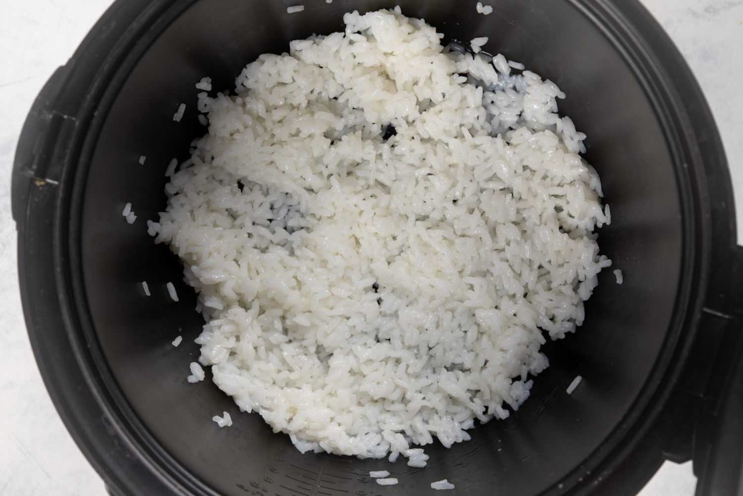 https://www.corriecooks.com/wp-content/uploads/2020/04/Cooked-rice-in-IP.jpg