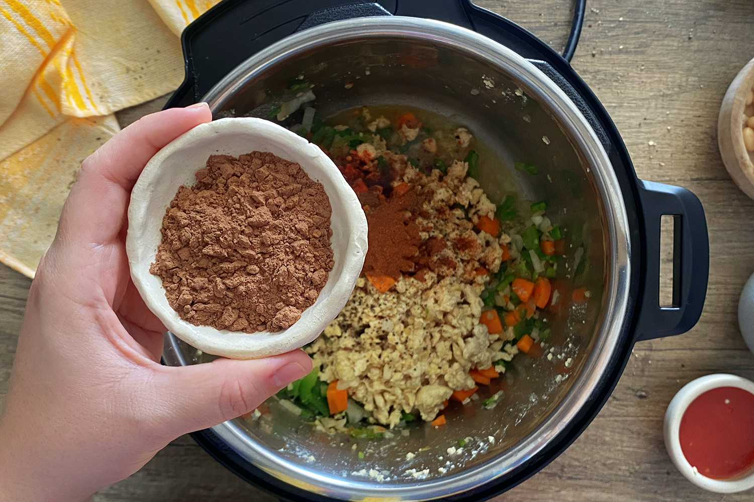 adding cocoa powder to chili