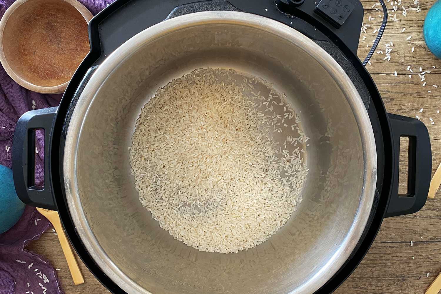 adding rice to cooker