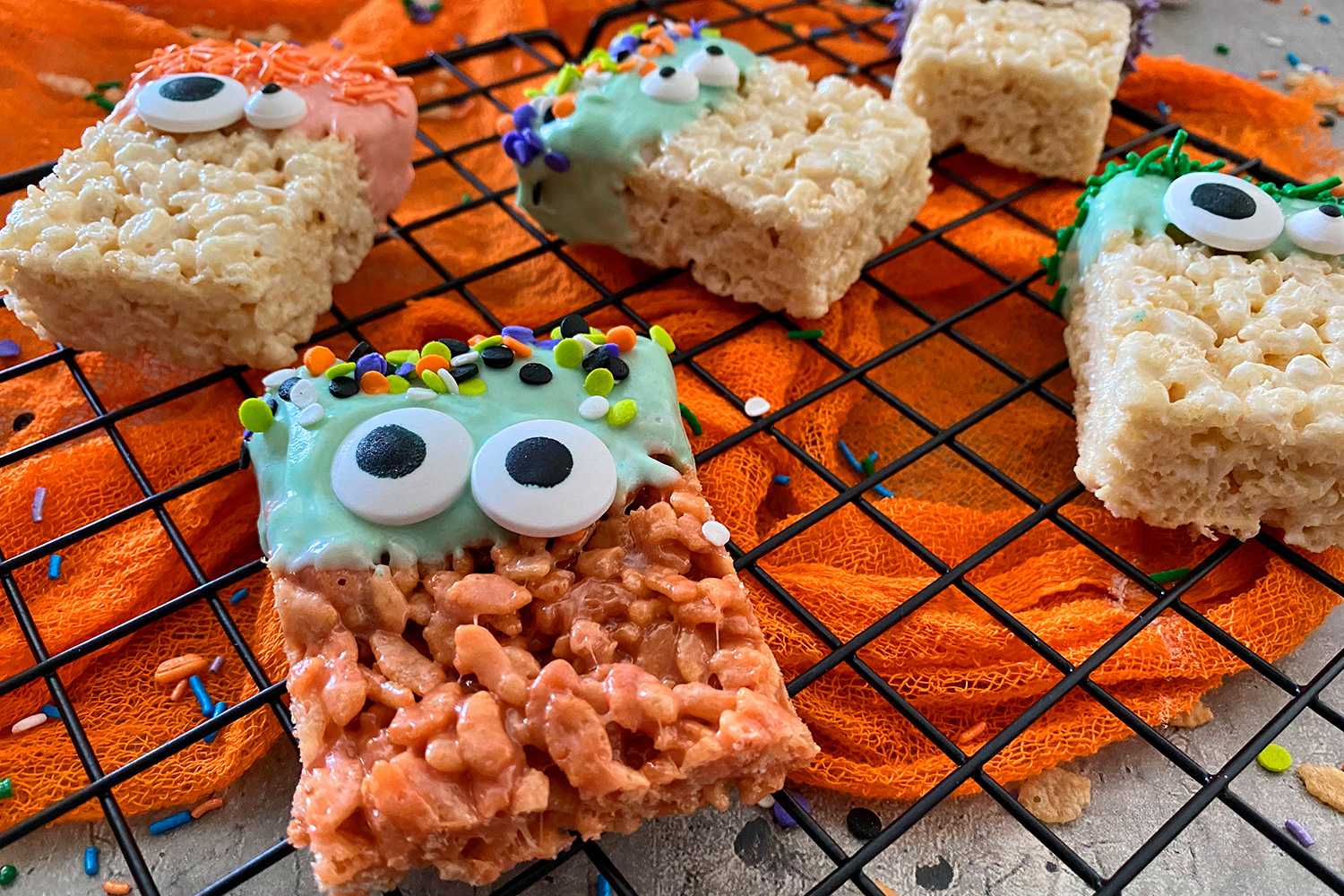 Colorful marshmallow treats with scary eyes and sprinkles