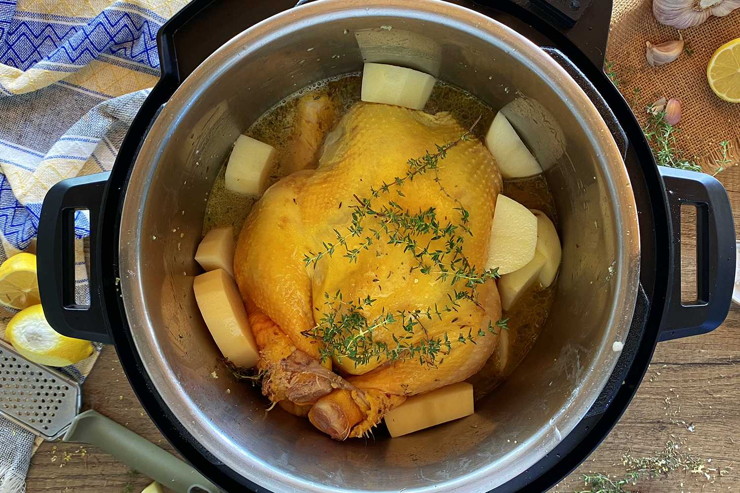 https://www.corriecooks.com/wp-content/uploads/2022/03/Cornish-hen-with-potatoes-inside-Instant-Pot.jpg