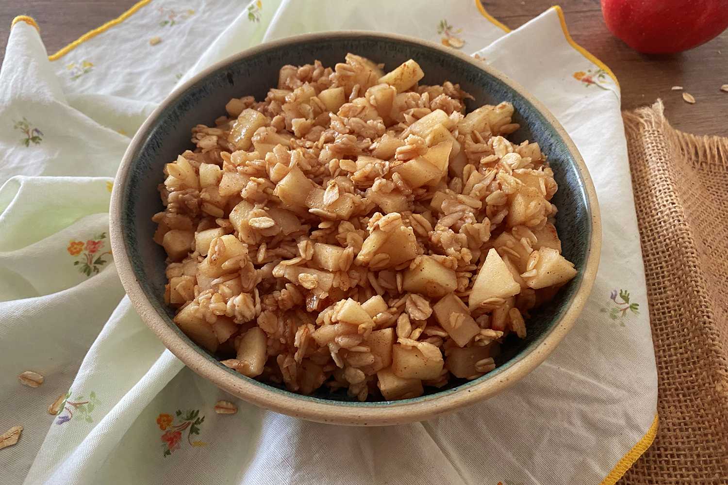 apple cubes combined oat and cinnamon inside a bowl