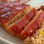 Turkey Meatloaf with peas and corn with ketchup on top