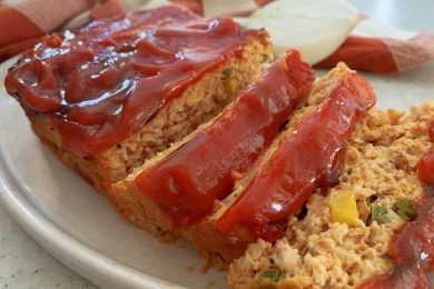 Turkey Meatloaf with peas and corn with ketchup on top