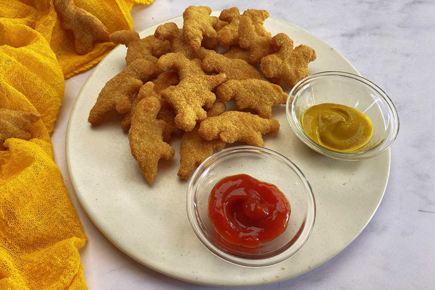 dino nuggets with ketchup and mustard