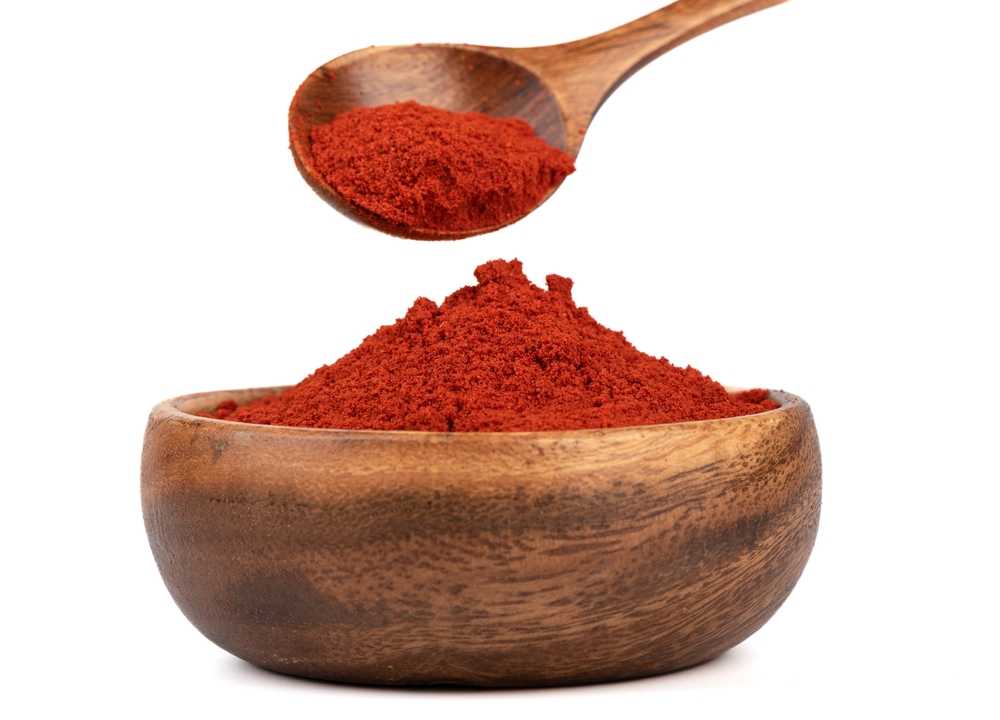 Smoked paprika in a wooden bowl