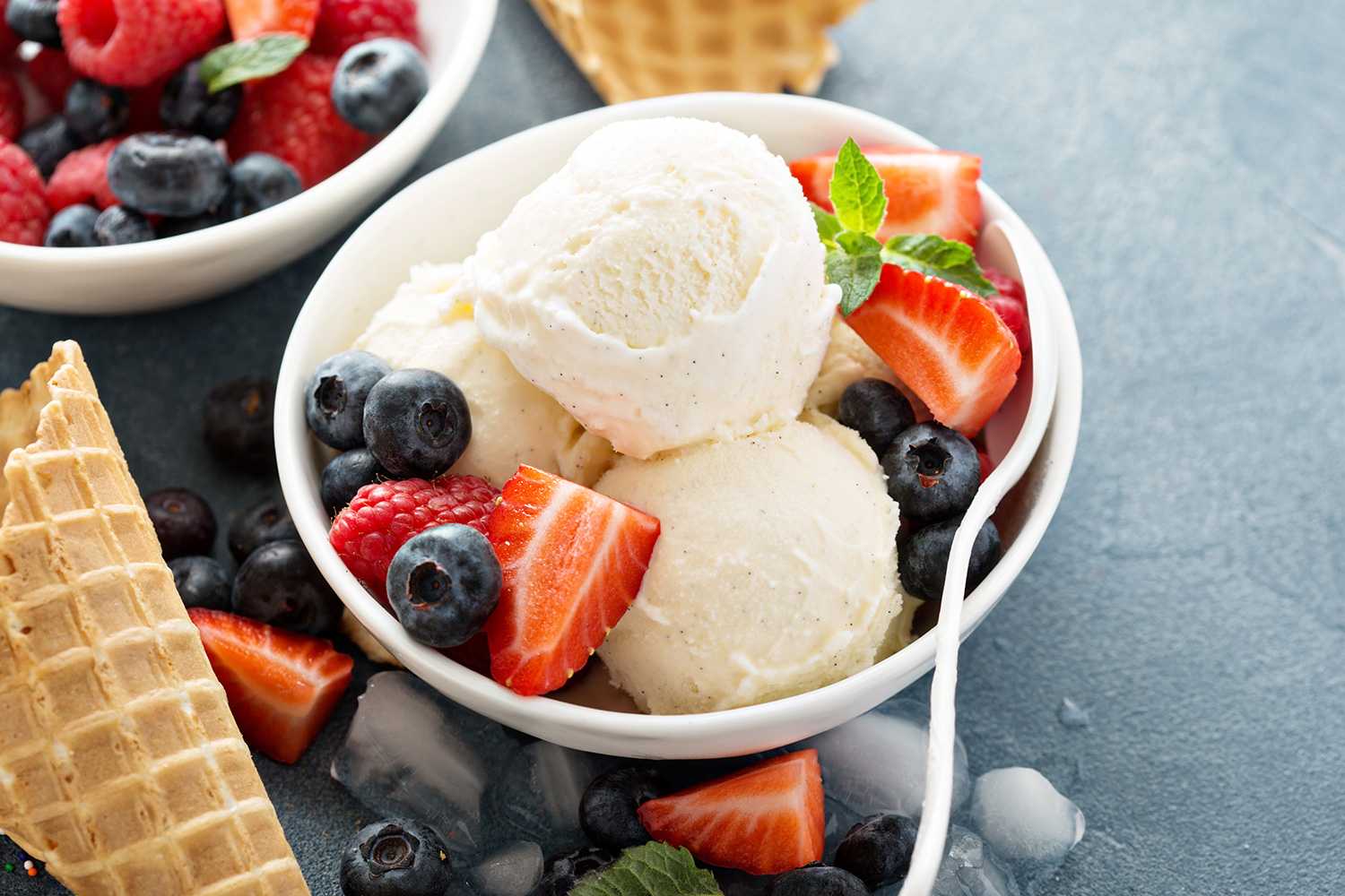 vanilla ice cream with blueberries and strawberries