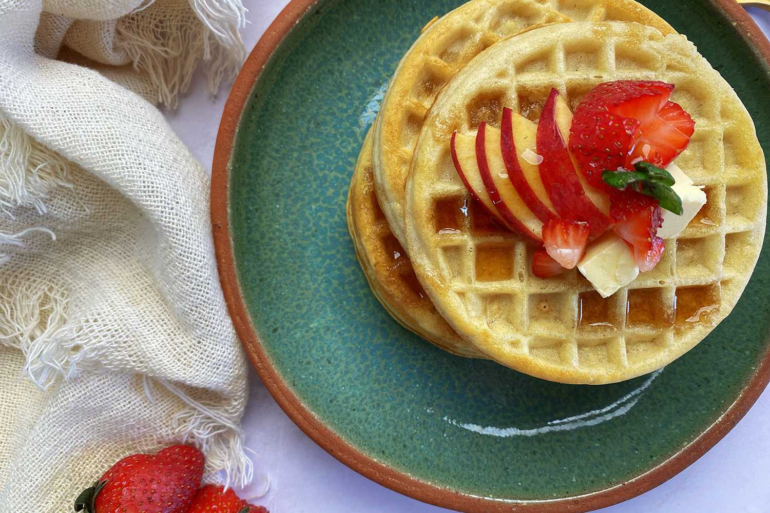 Cook frozen waffles in the air fryer to get a crispy golden waffle. Top with your favorite fresh fruit.