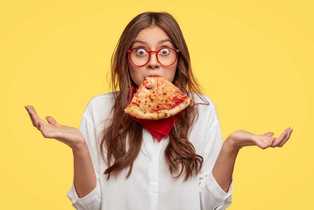 woman eats pizza overrated