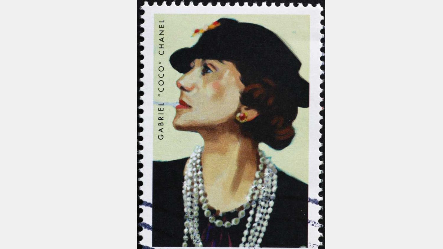 Milan, Italy - November 09, 2019: Famous stylist Gabriel Coco Chanel on postage stamp