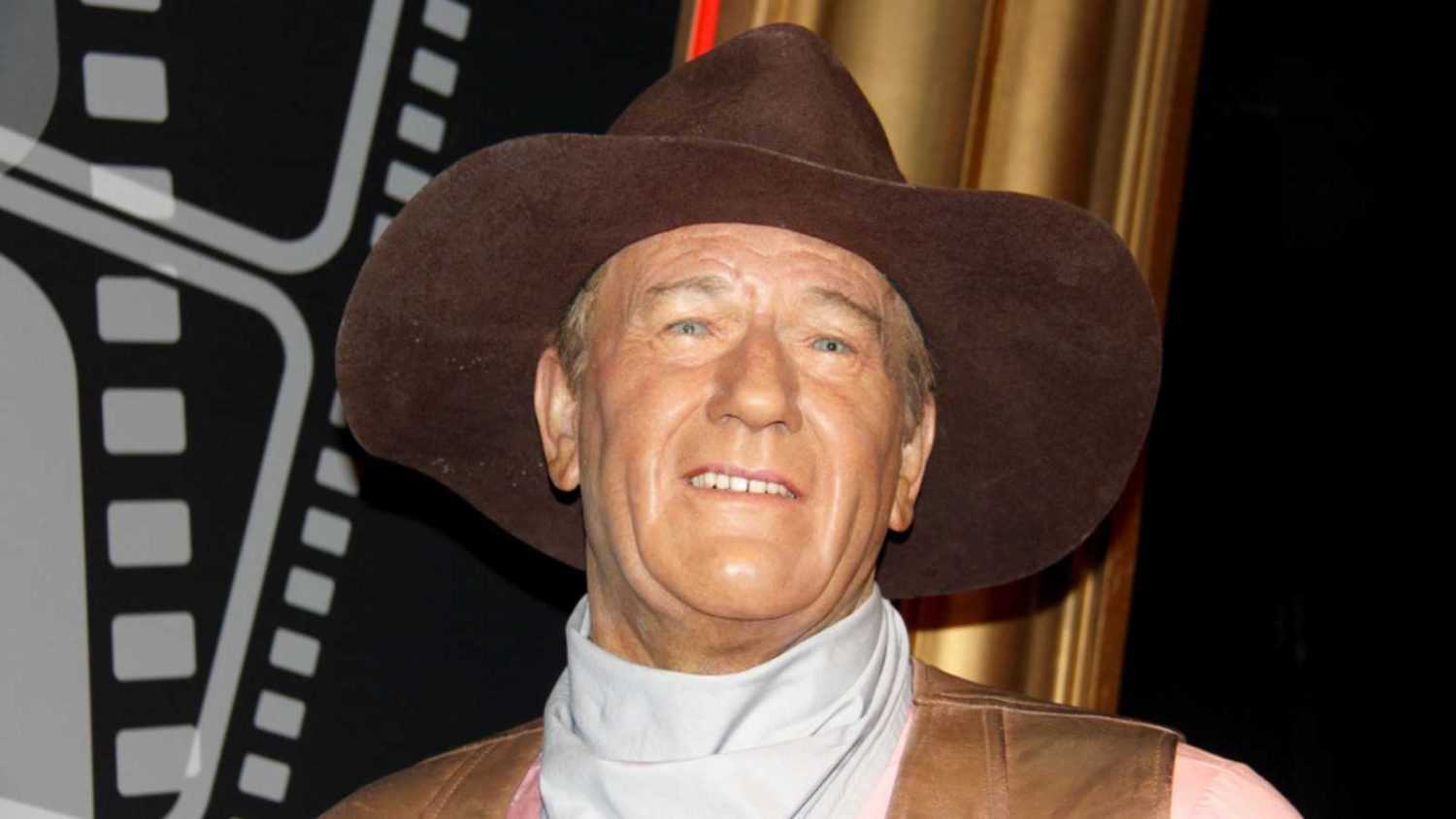 London, - United Kingdom, 08, July 2014. Madame Tussauds in London. Waxwork statue of John Wayne. Created by Madam Tussauds in 1884, Madam Tussauds is a waxwork museum and tourist attraction.