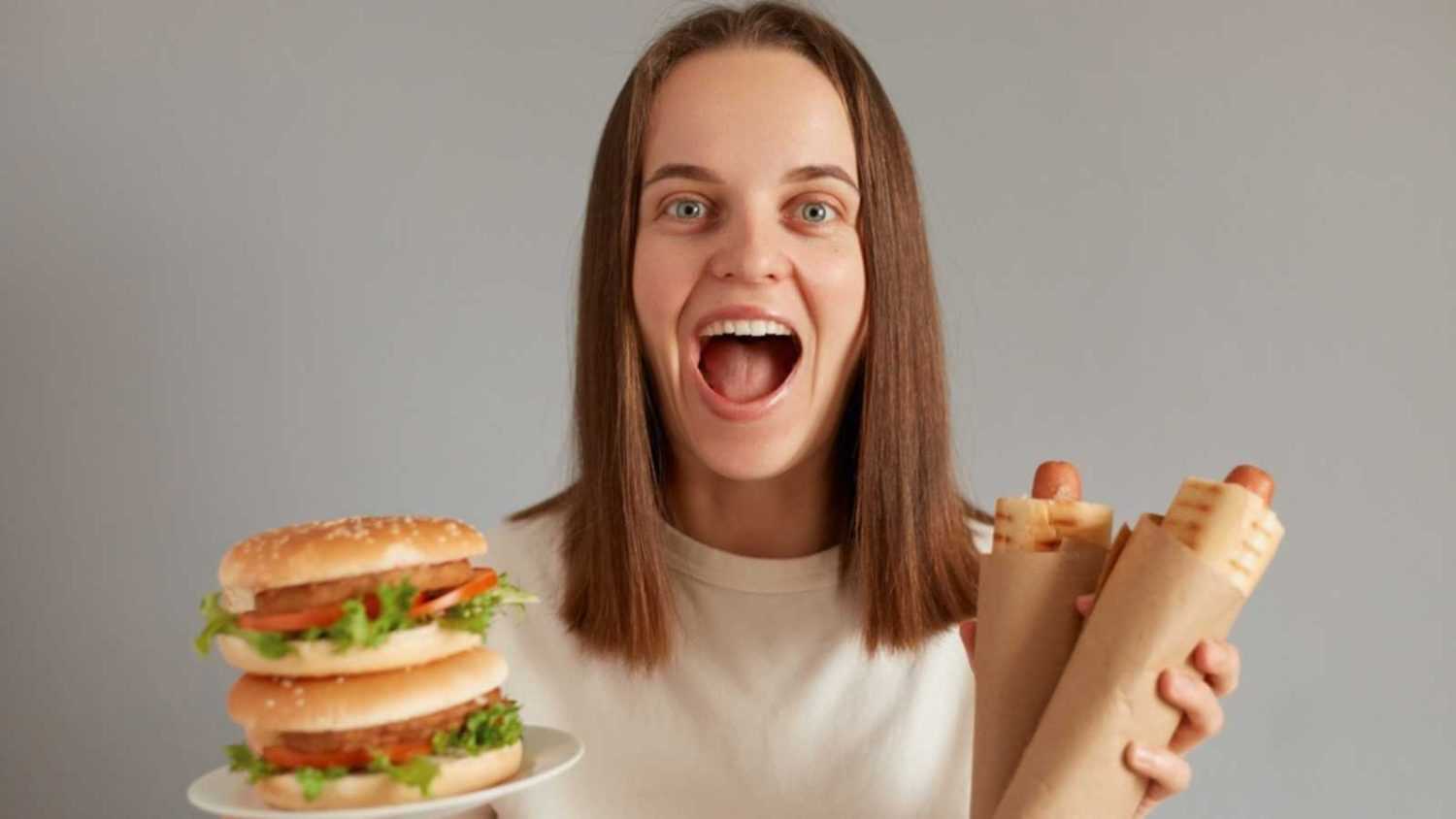 Woman eating Burger