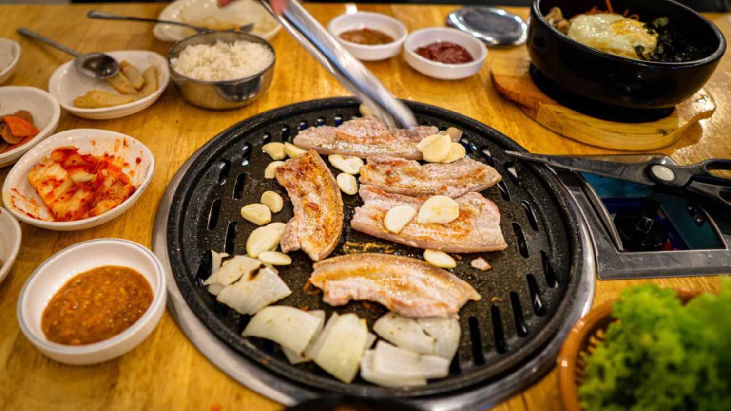 Korean Barbecue, where you could grill your own selected meat, and have side dishes such as the kimchi soup.