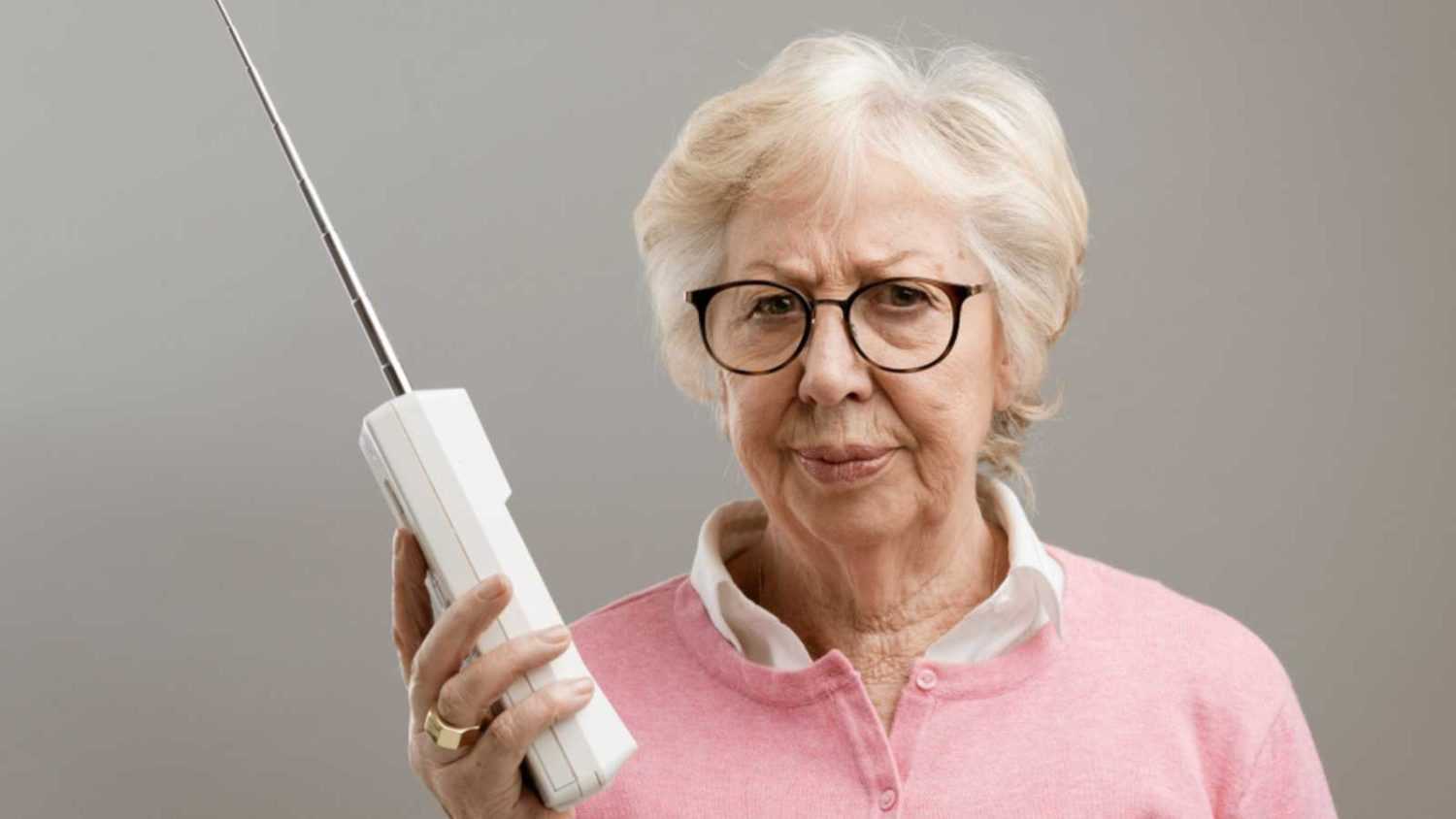 Old woman with cordless phone