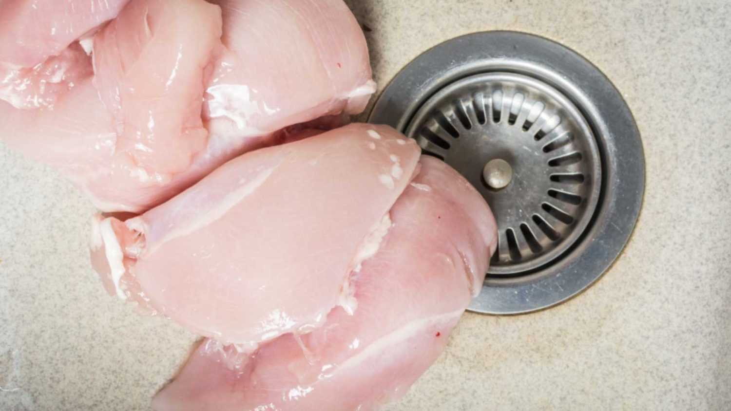 Thawing chicken in sink
