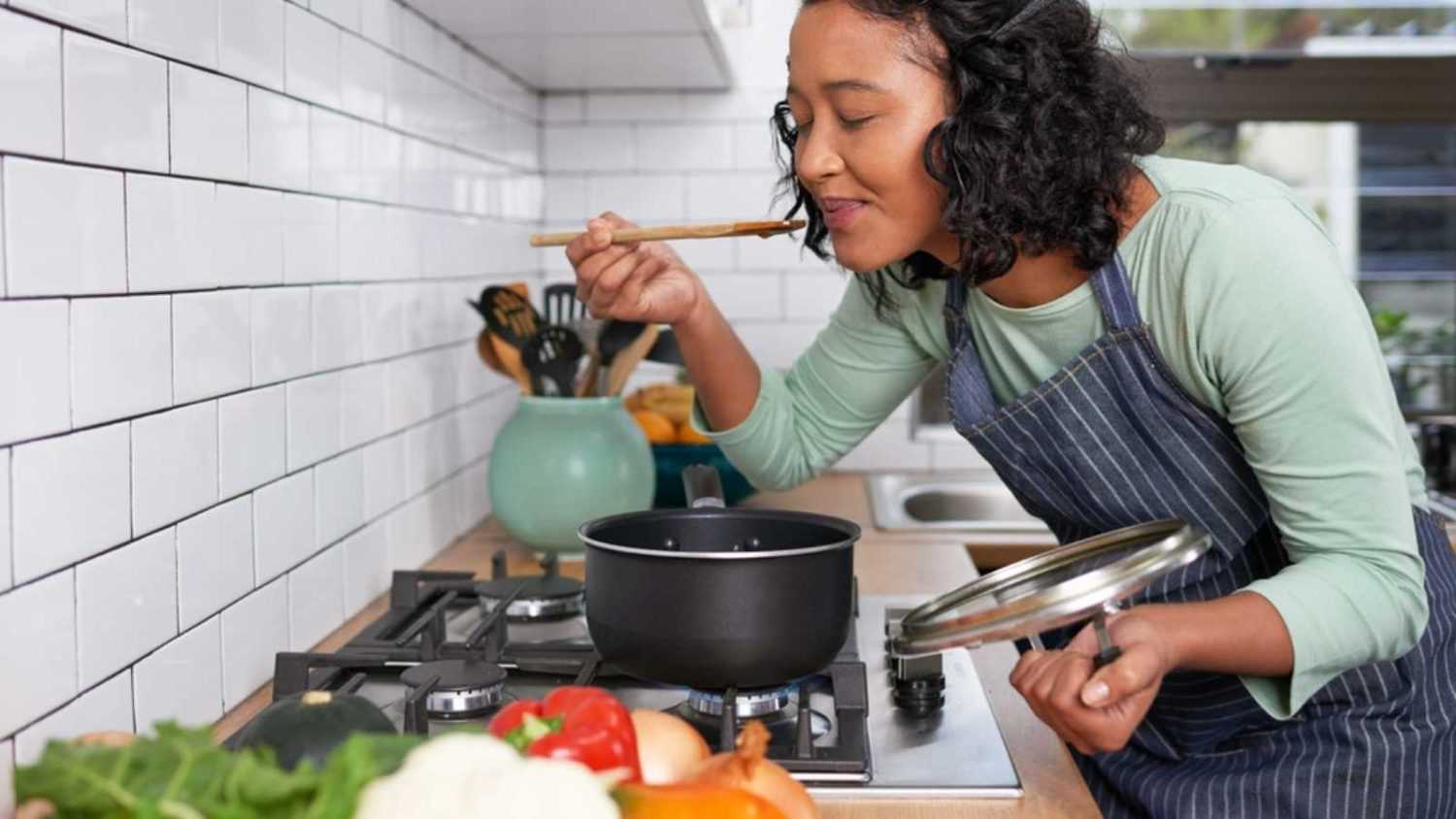 Woman smelling the aroma of dish