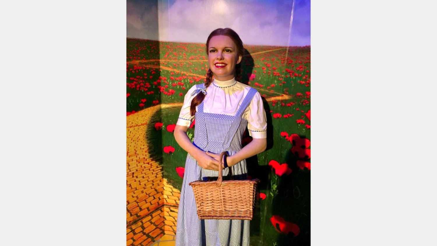 New York, NY, USA - October 2014: Judy Garland, american actress and singer as Dorothy from The Wizard of Oz, in the Madame Tussaud wax museum, TImes Square, New York City.