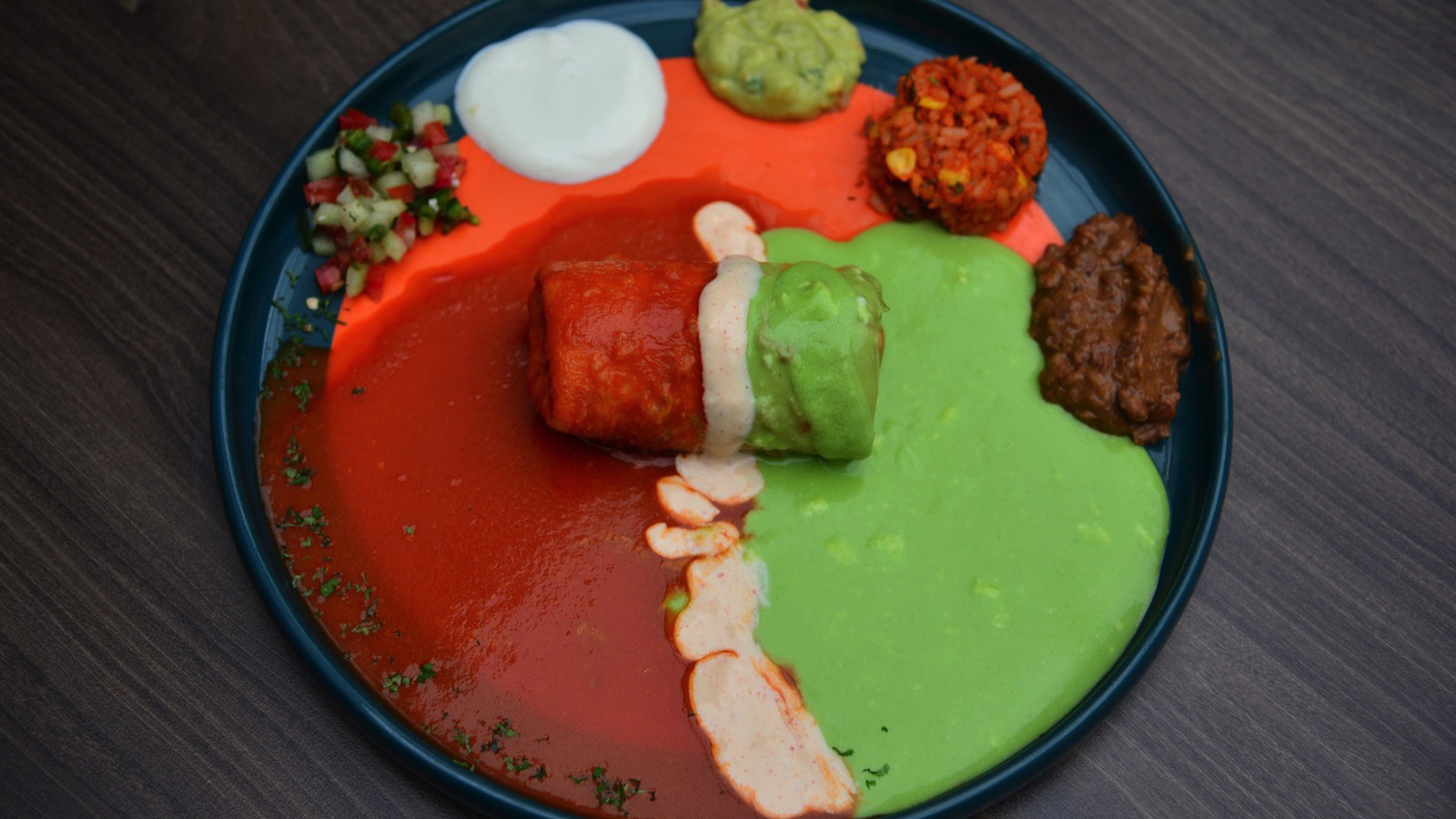 Chimichangas with Mexican condiments and sauces