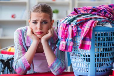 Woman tired of doing laundry