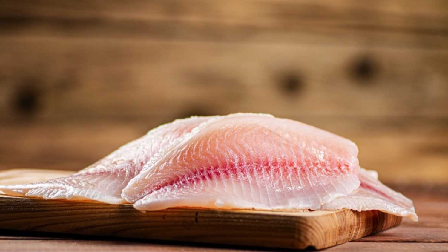 Fresh fish fillet on a cutting board