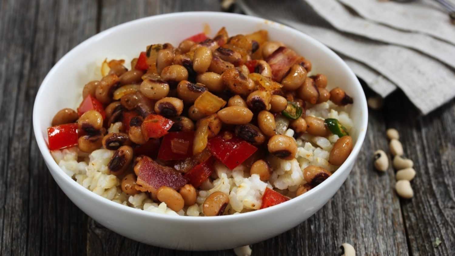 Homemade Southern Hoppin John or Carolina peas and rice served in a white bowl