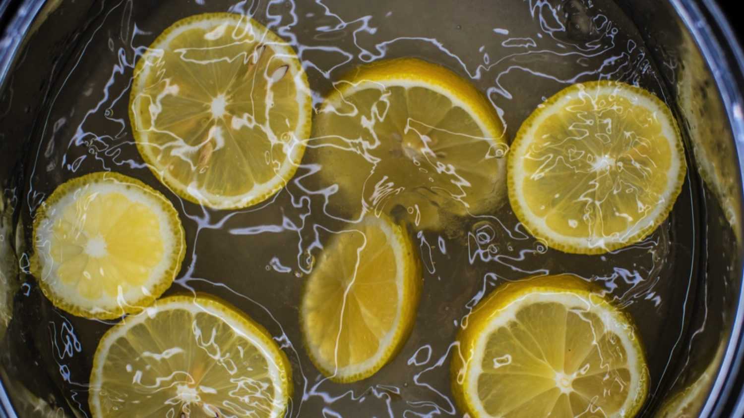 Lemon boiling in water