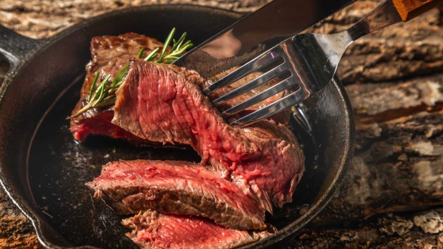 Thick sliced steak made with skillet in frying pan