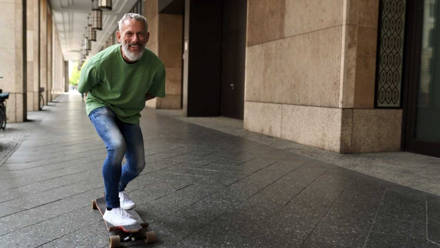 Old man Skateboarding