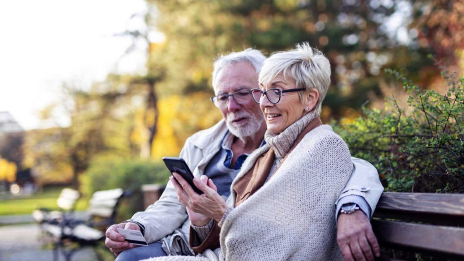 Old couples using mobile